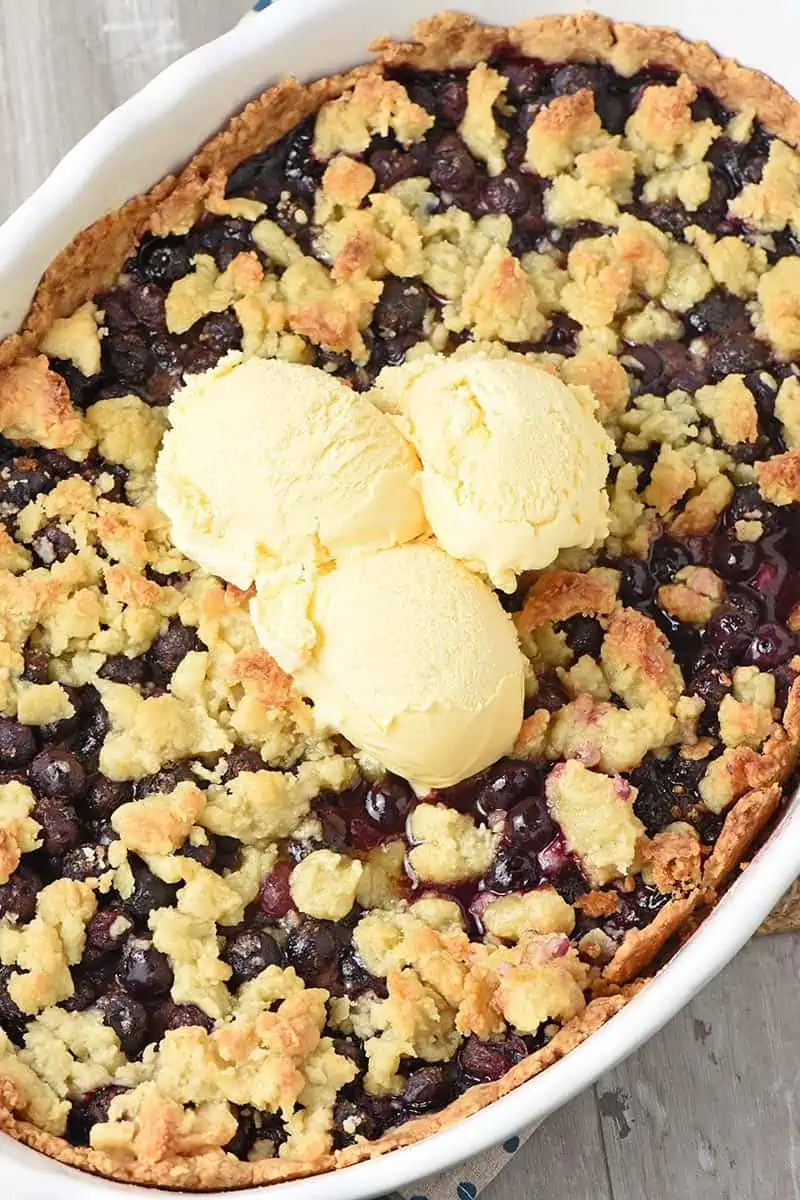 old-fashioned recipe for blueberry cobbler with vanilla ice cream