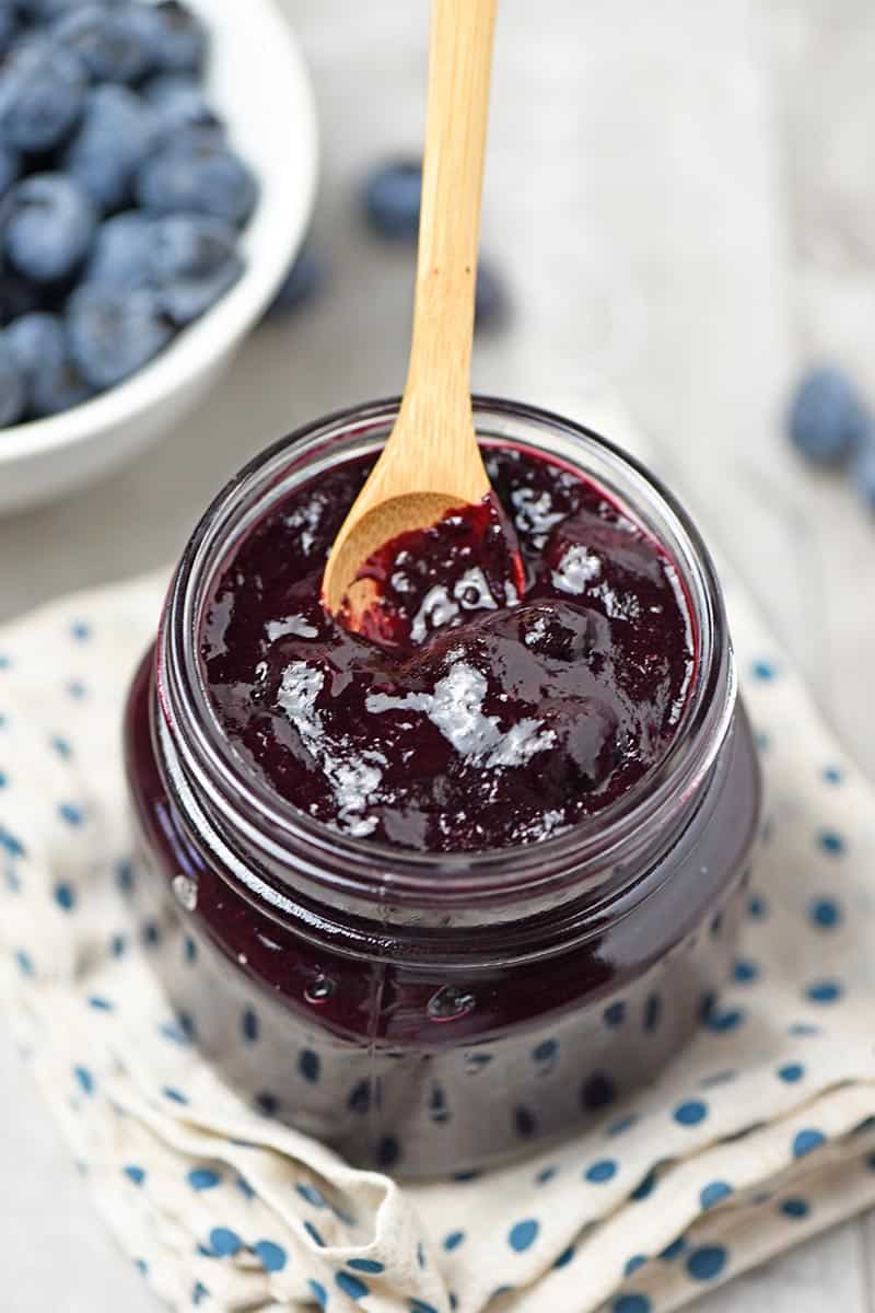 close up look at easy blueberry pie filling in mason jar