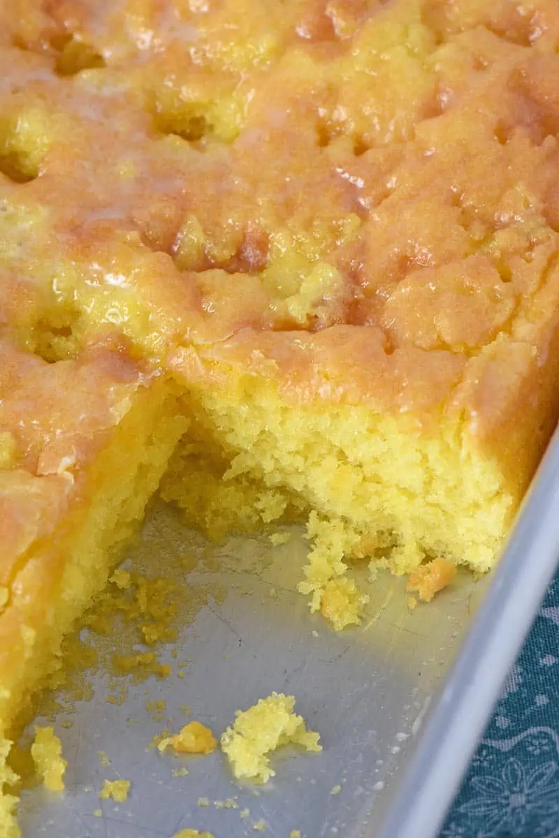 lemon poke cake in a cake pan