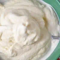 homemade vanilla ice cream in a green pioneer woman bowl