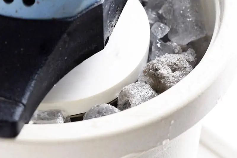 ice cream maker with ice and rock salt, freezing old fashioned ice cream