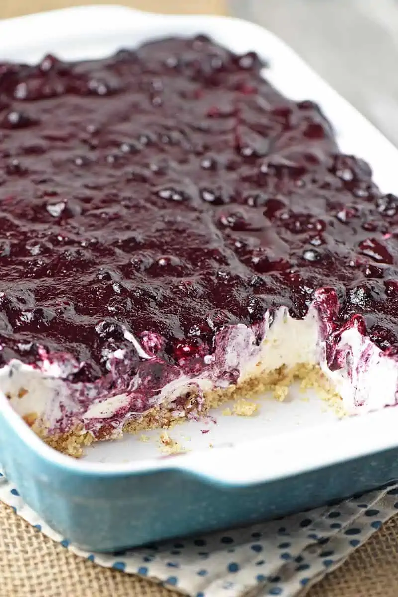 easy blueberry dessert made in a blue baking dish