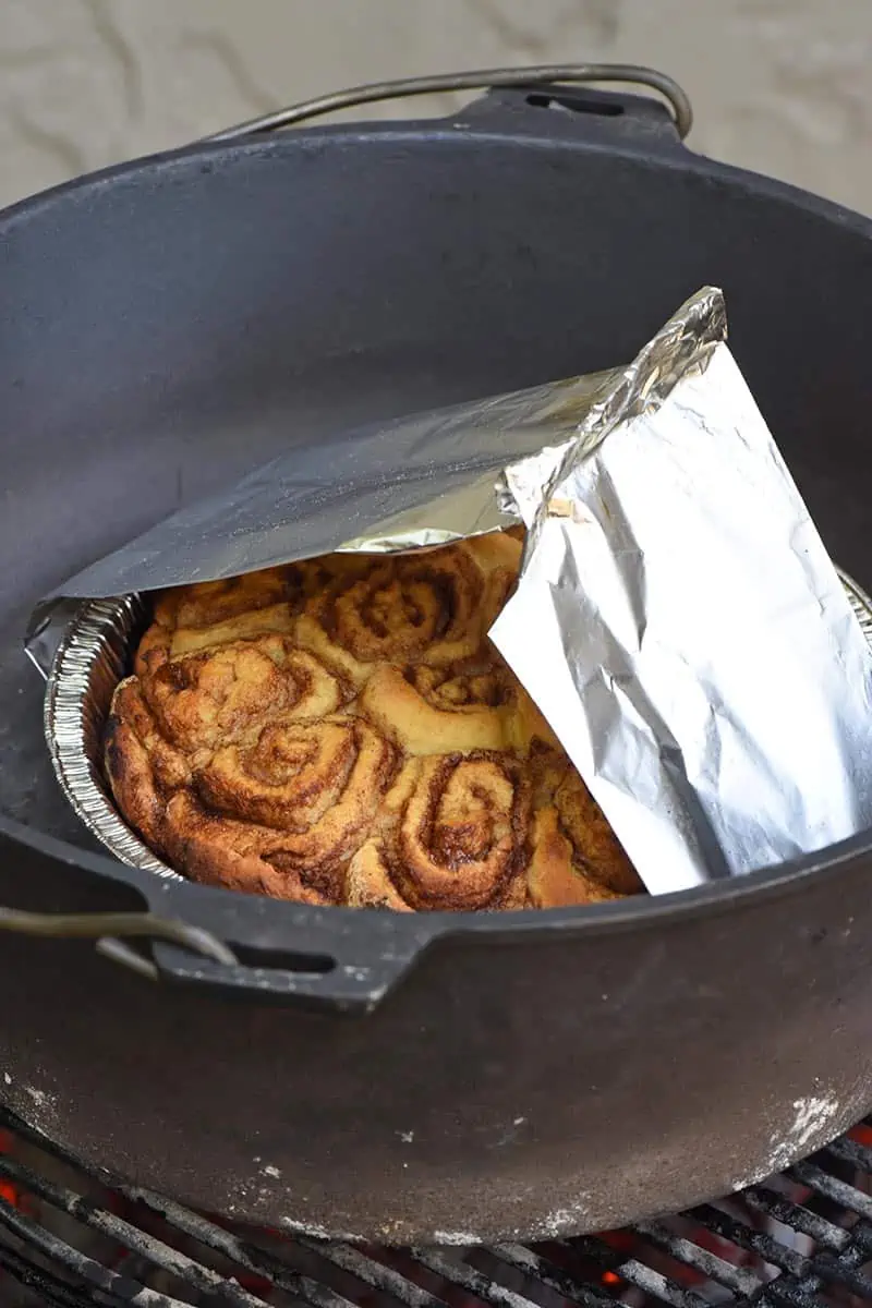 biscuit mix Dutch oven cinnamon rolls cooking in cast iron Dutch oven on the grill