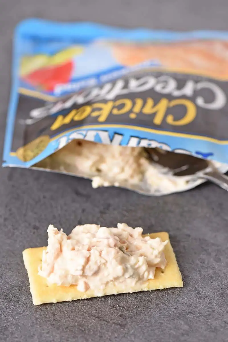 StarKist Chicken Creations Chicken Salad on a cracker, eating right out of the pouch