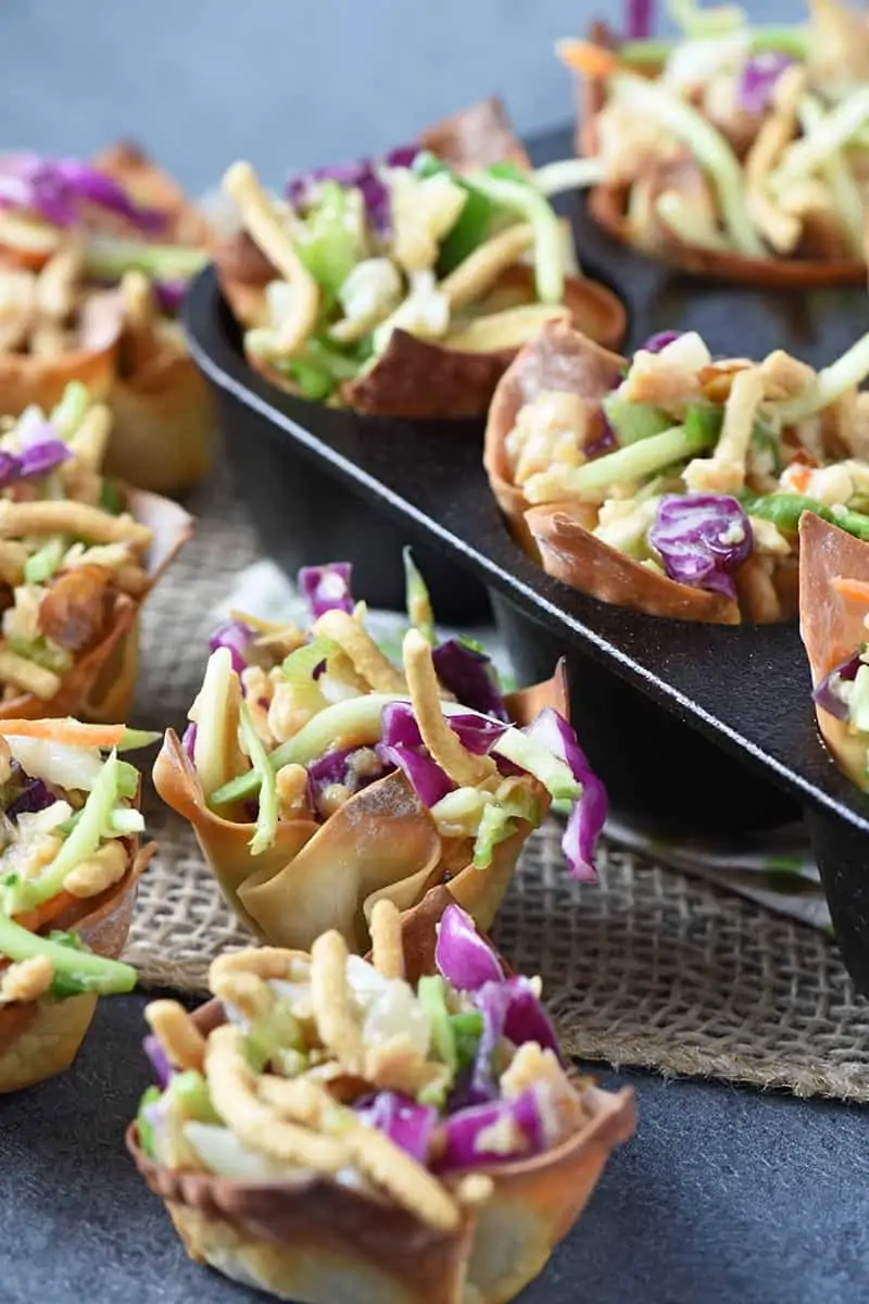 bite sized wonton appetizers filled with Asian chicken salad