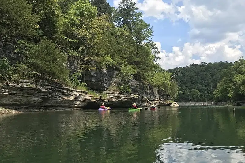 kayakers in a cove in Hobbs State Park on Beaver Lake