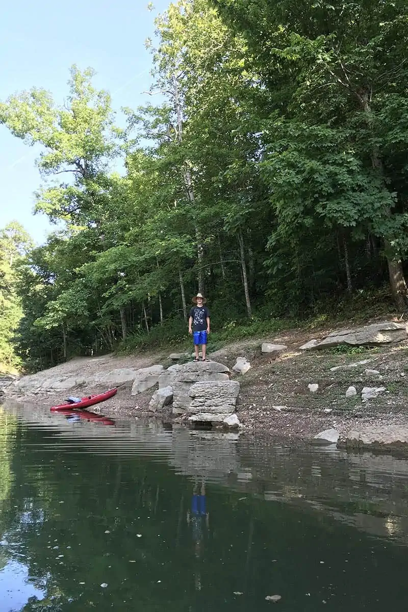 kayaker exploring maple trees in Hobbs State Park