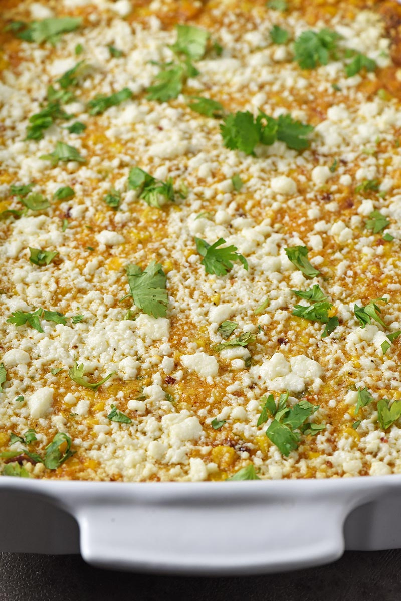 Mexican corn casserole with Cotija cheese crumbled on top