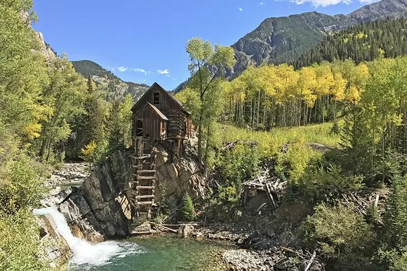 Crystal Mill and the Crystal River Colorado with golden yellow aspens in autumn