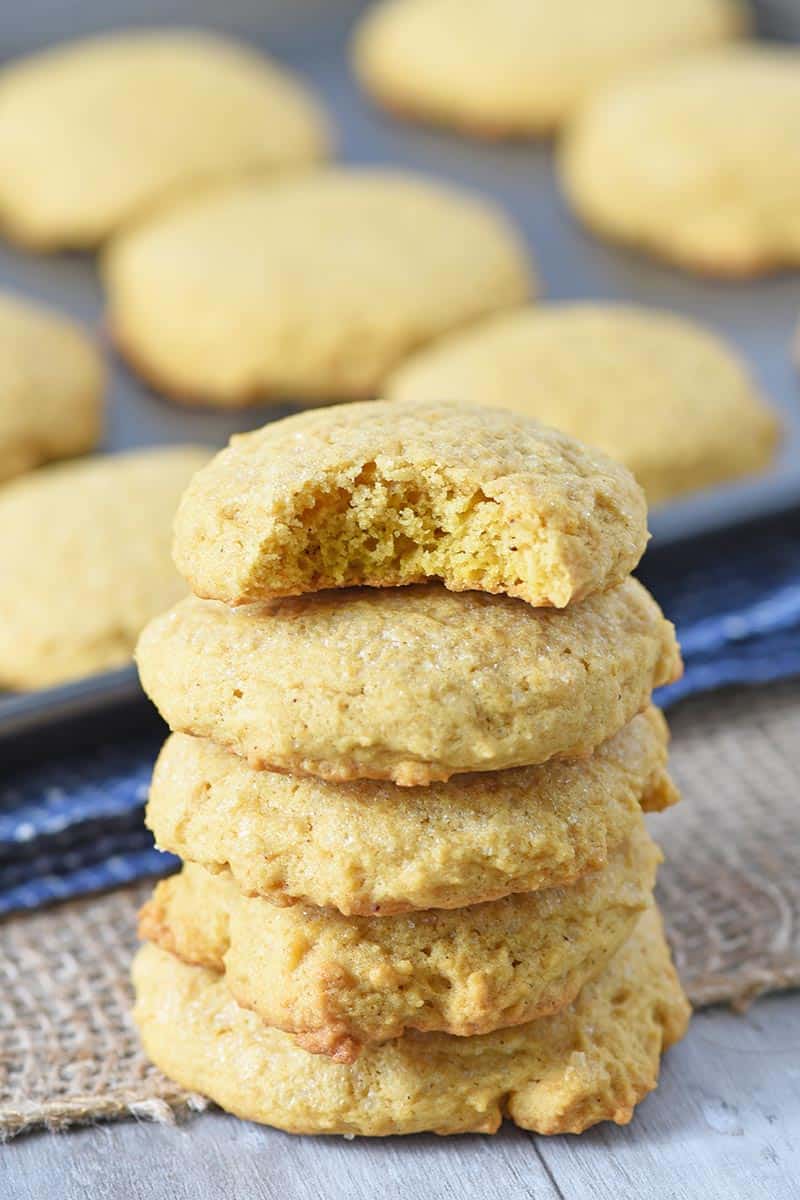 homemade pumpkin sugar cookies from scratch with bite out of cookie