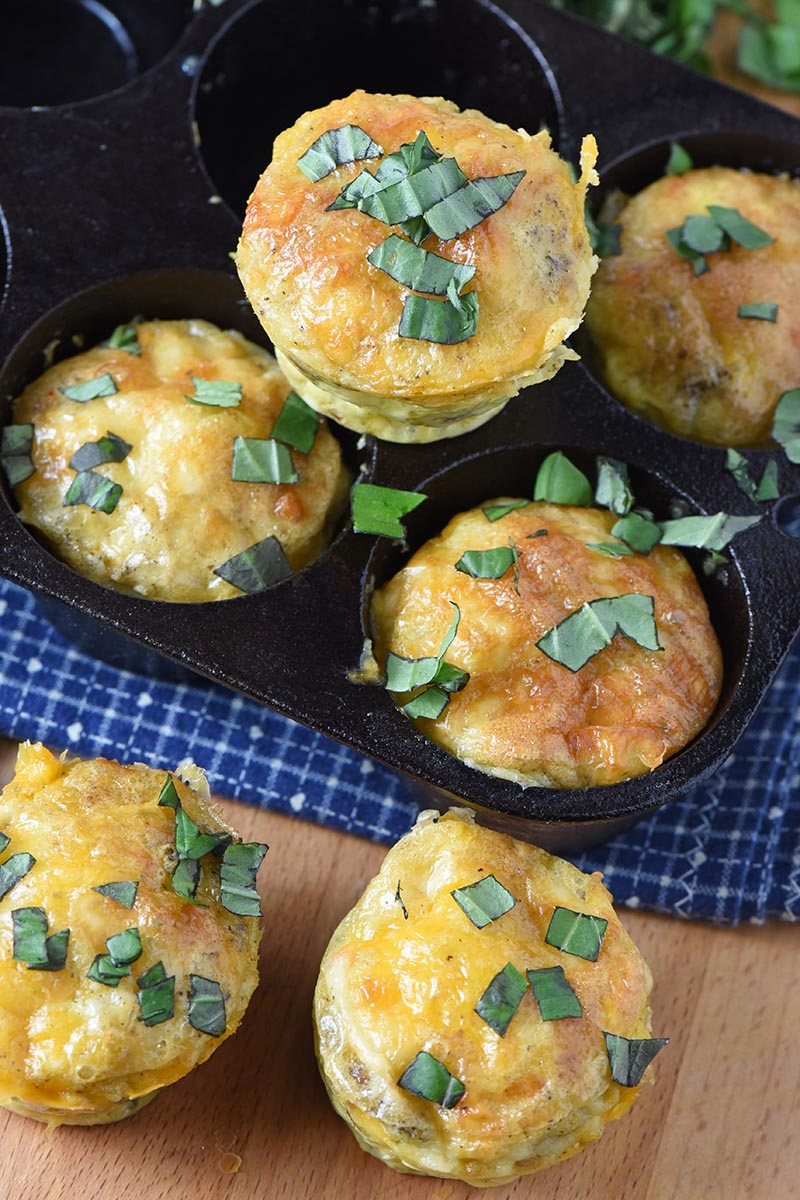 sausage egg muffins popped out of muffin tin, ready to eat for an easy breakfast