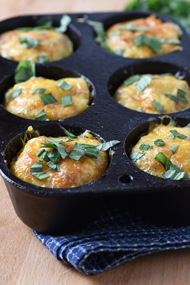 low carb sausage egg muffins in a muffin pan