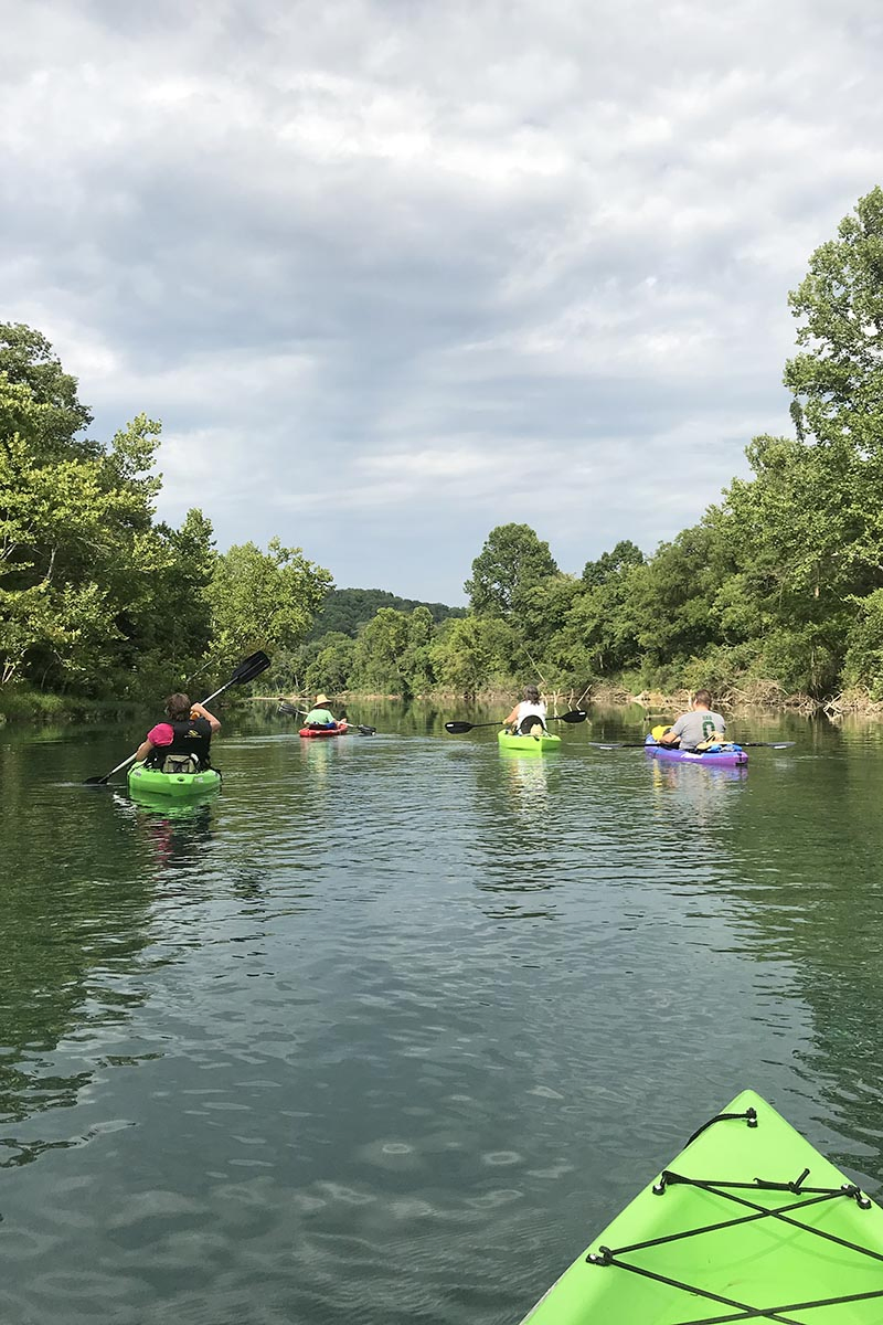 family kayaking the Jacks Fork River from Alley Spring to Eminence, Missouri