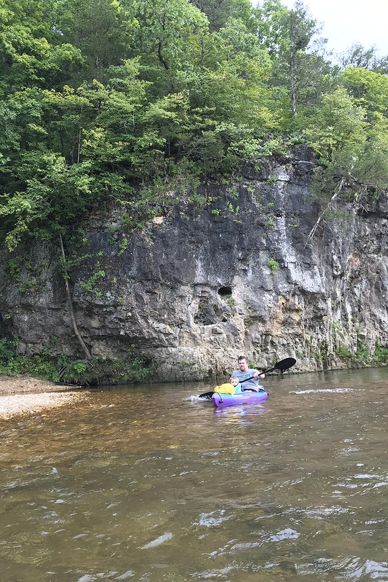 paddling through small rapids on the Jacks Fork River, Eminence, MO float trip