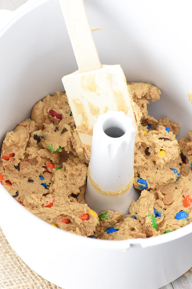 monster cookie dough in white mixer bowl