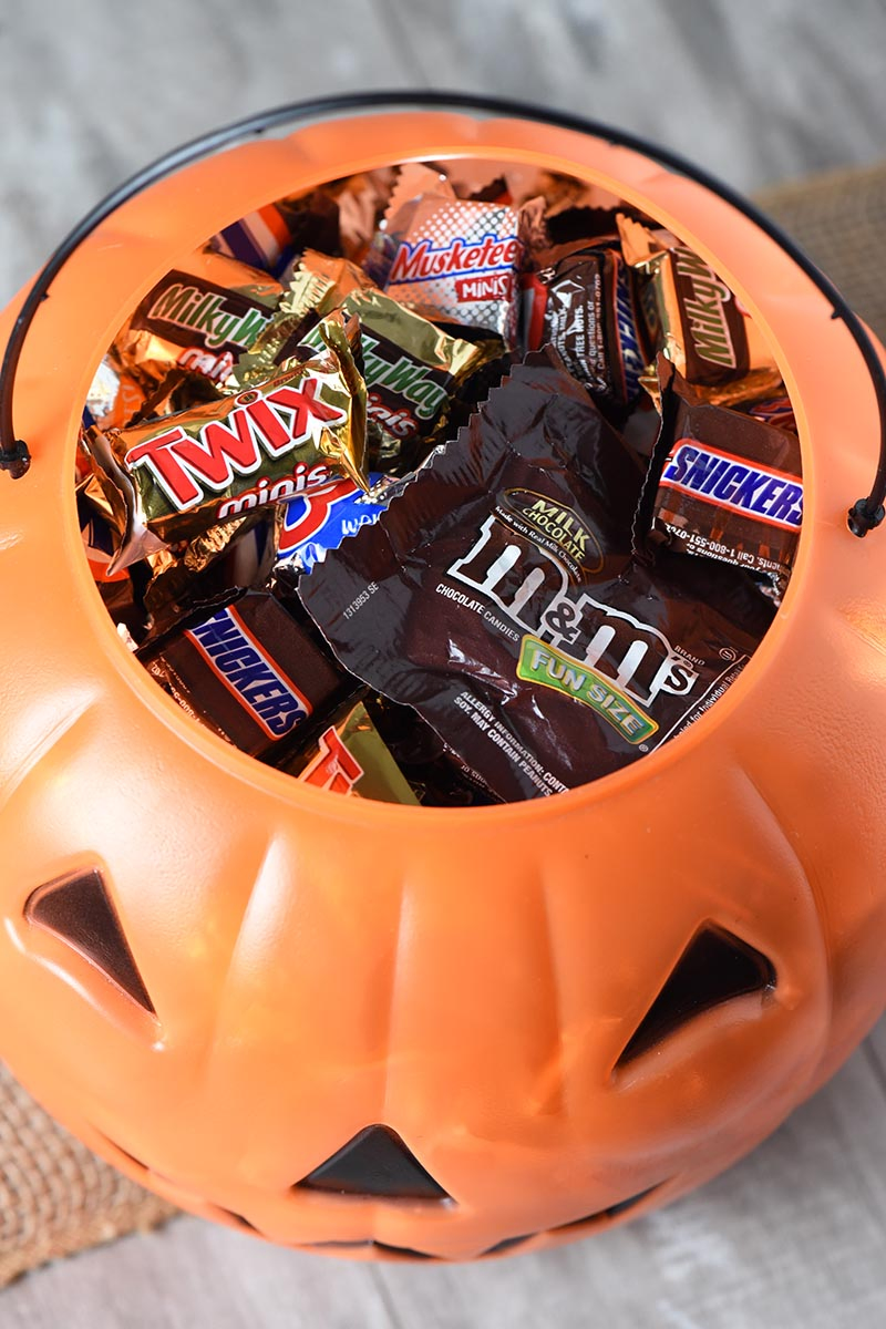halloween candy in jack-o-lantern pumpkin bucket for monster cookies recipe