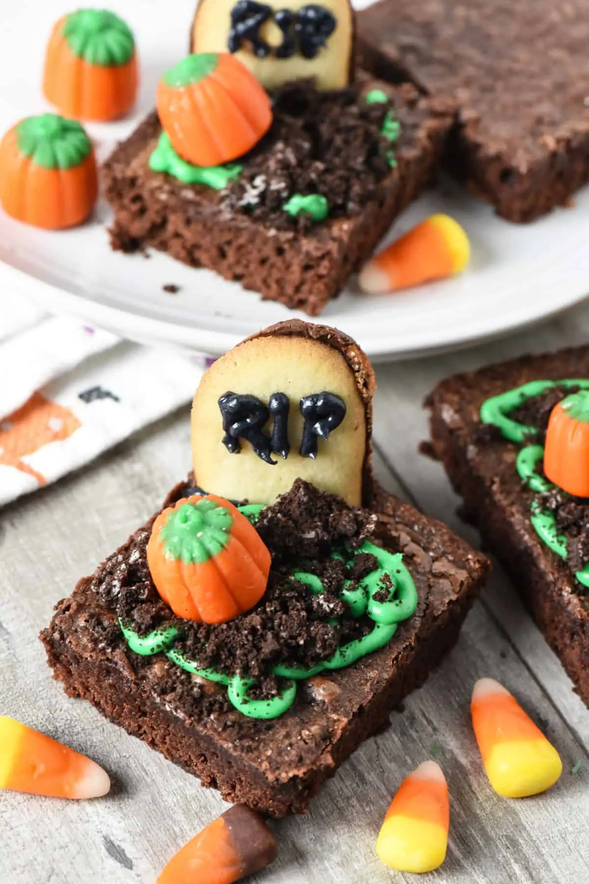 tombstone brownies with candy corn on wood countertop