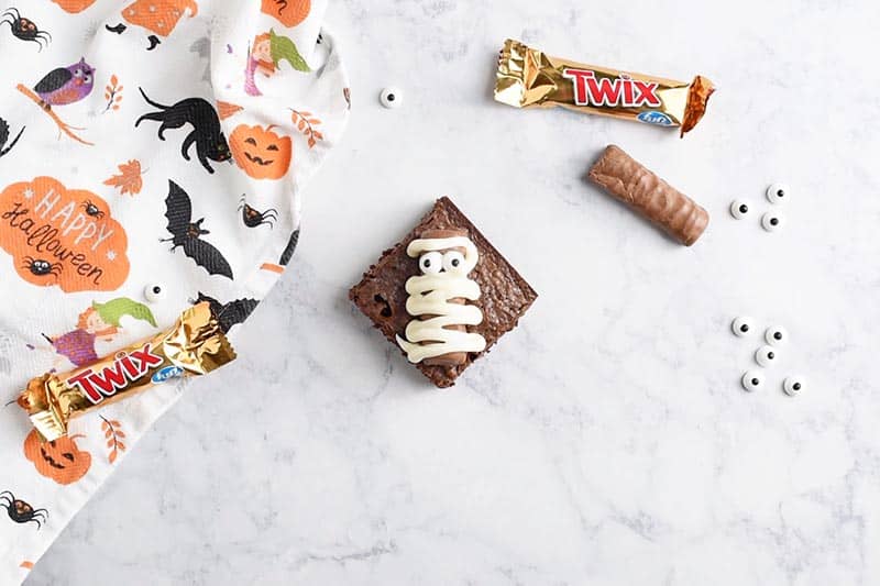 Halloween treats made with Twix bar mummy Halloween brownies
