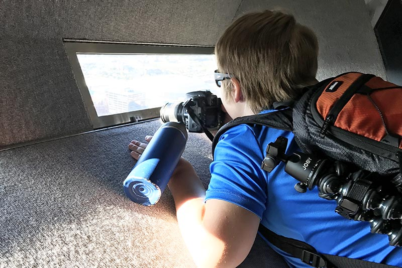 boy enjoying the view of St. Louis from the top of the Arch