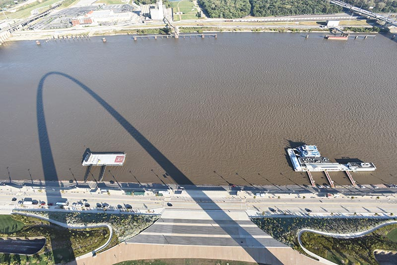 view of the Mississippi River with an Arch shadow from the top of the Gateway Arch