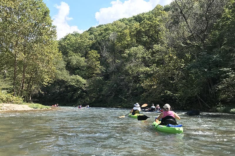kayaking through ripples on the Current River