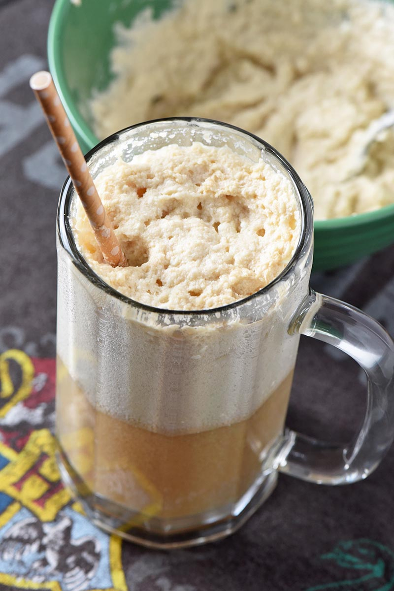 homemade butterbeer recipe in glass mug with whipped cream