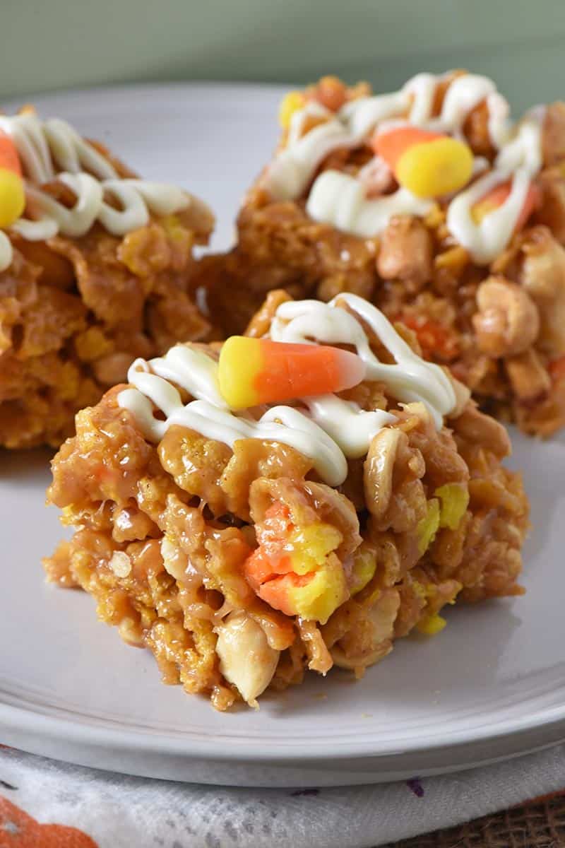 peanut butter Corn Flake bars with candy corn on gray plate
