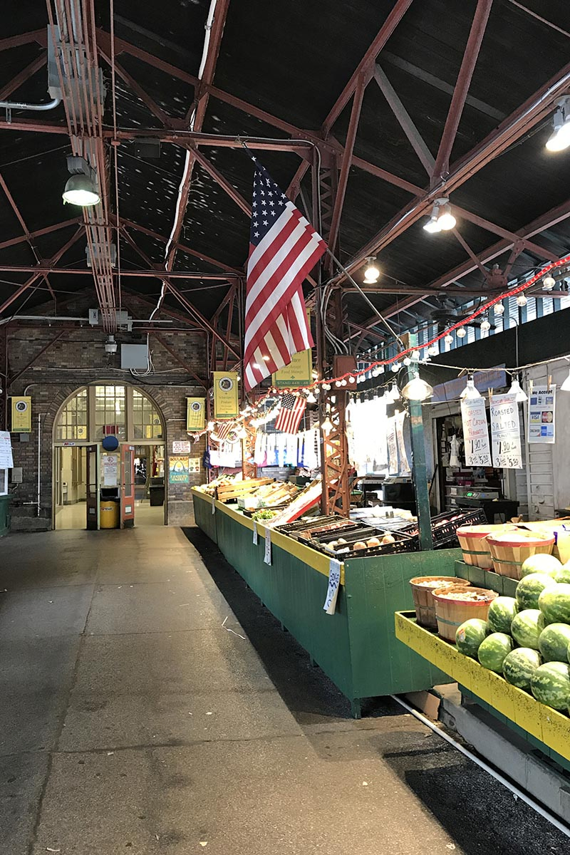open air stalls at Soulard Market with fresh vegetables and fruits