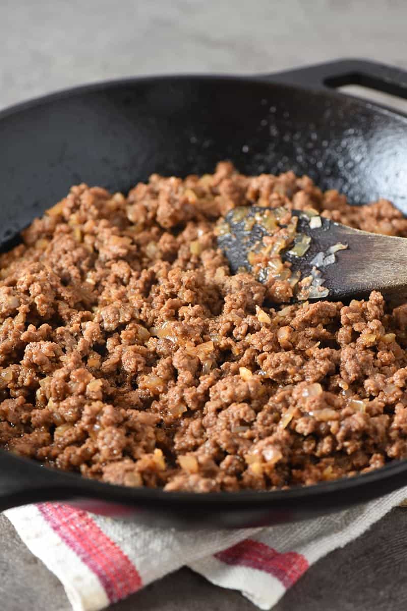 meat for sloppy joes or juicy burger recipe in cast iron skillet