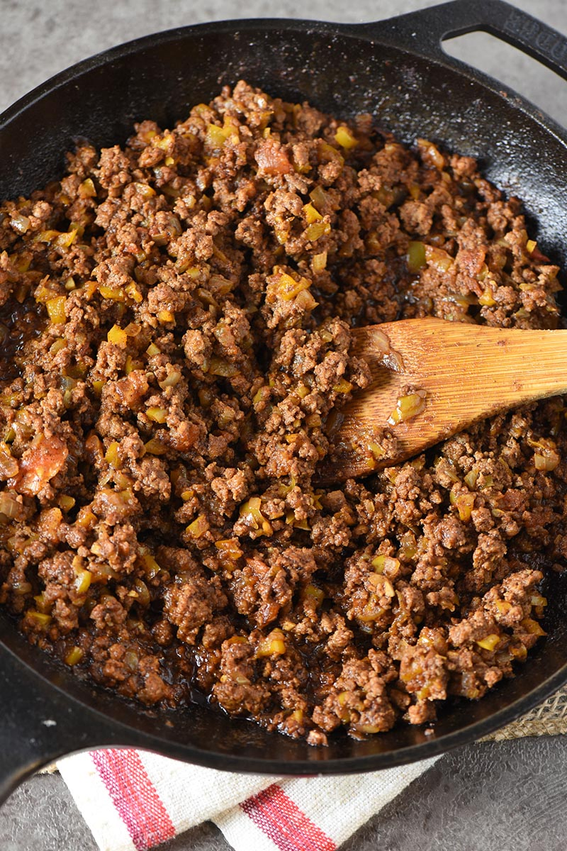 taco sloppy joes ground beef mixture in cast iron skillet