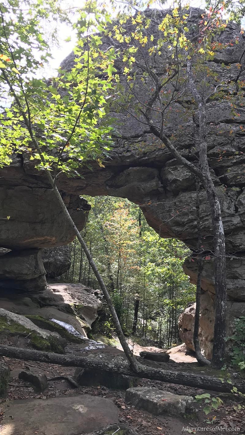 hiking seven hollows trail to natural bridge in petit jean state park in arkansas