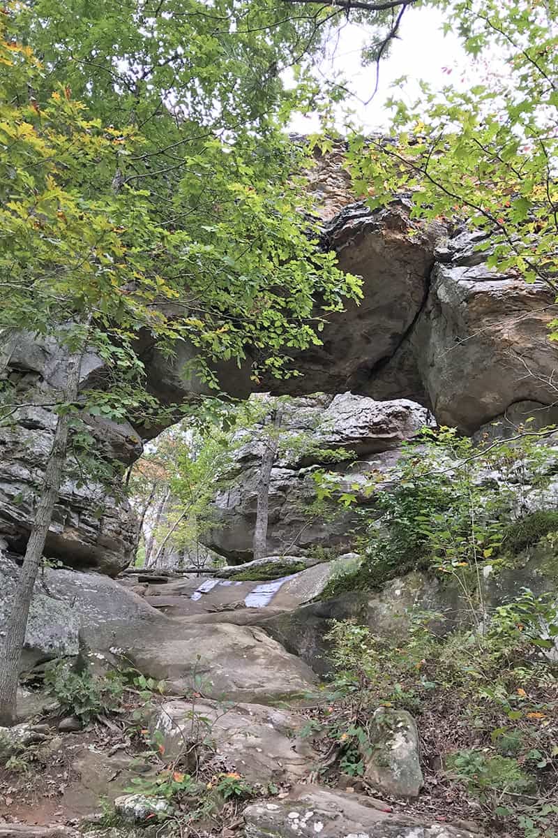 the Natural Bridge on Seven Hollows Trail in Petit Jean State Park, one of the most beautiful Arkansas State Parks