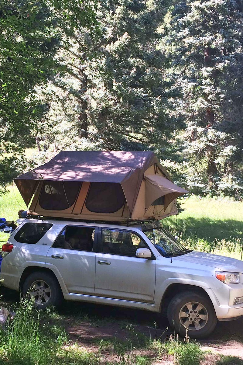 CVT tent, car roof tent on white Toyota 4Runner