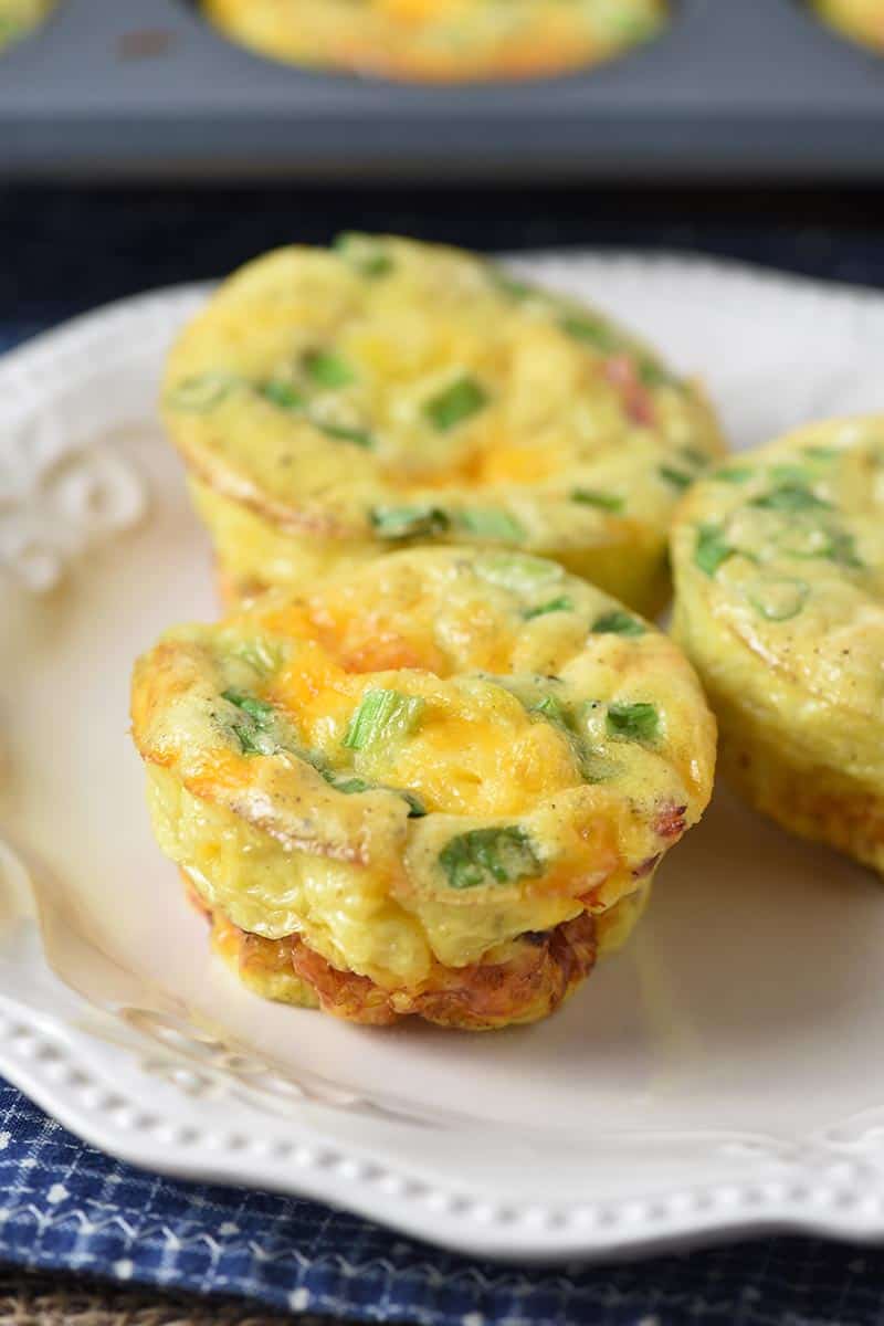 ham and cheese egg muffin cups on a white plate