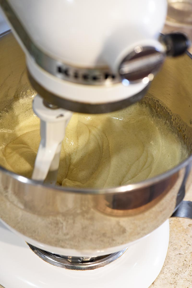 using KitchenAid mixer to cream butter and sugar for chocolate crinkle cookie recipe