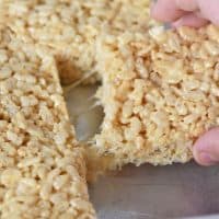 pulling Rice Krispie treats out of the pan