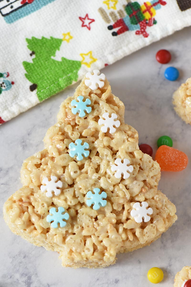snowflake sprinkles on Christmas tree Rice Krispie treats