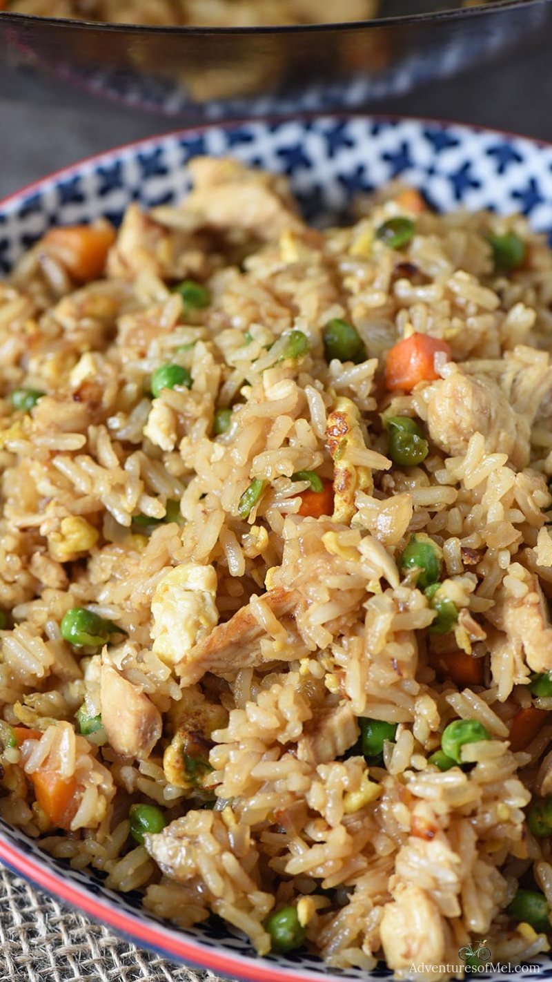 deliciously easy chicken fried rice recipe in a blue bowl