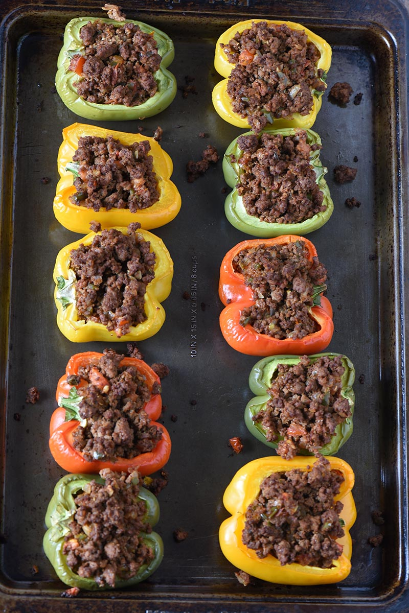 ground beef taco stuffed peppers, baked on baking sheet
