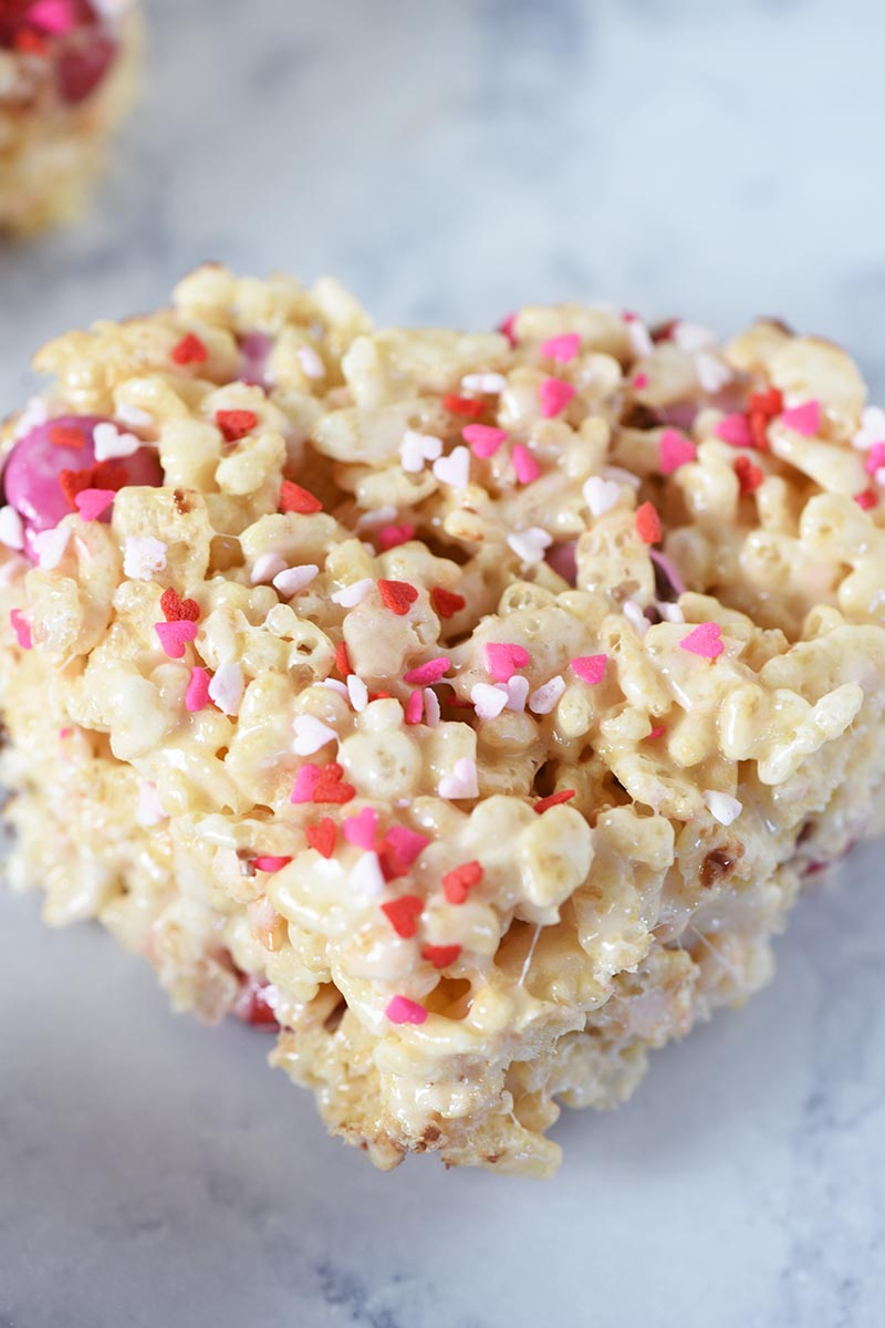 heart shaped Valentine marshmallow treats with M&M's and heart Valentine sprinkles