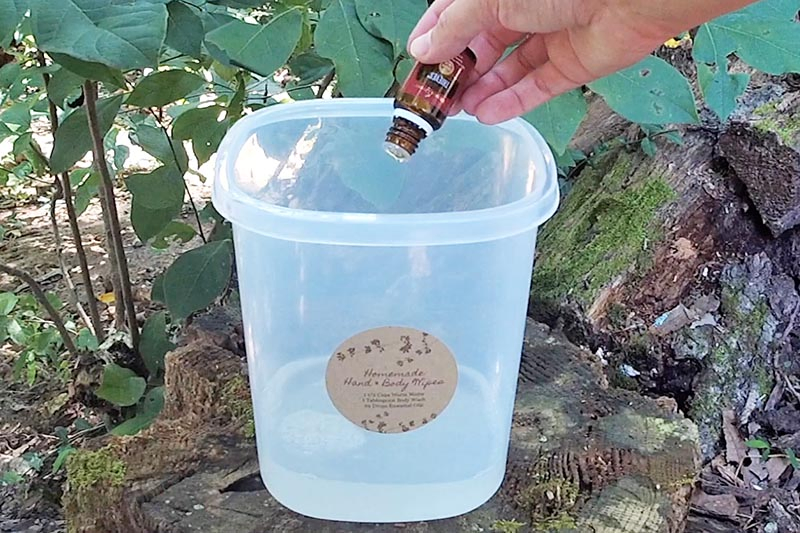 adding essential oils, like Thieves, to mixture for camping wipes in plastic canister