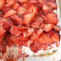 strawberry delight no bake dessert in blue baking dish
