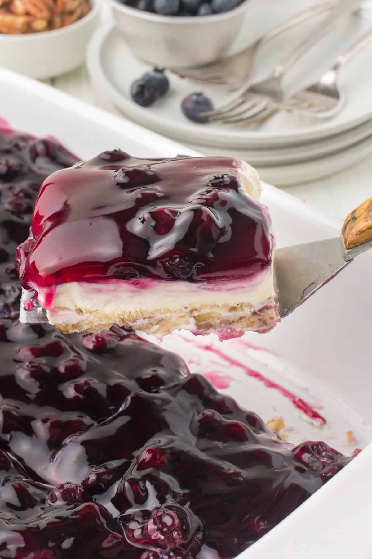 clean slice of blueberry yum yum on a metal spatula