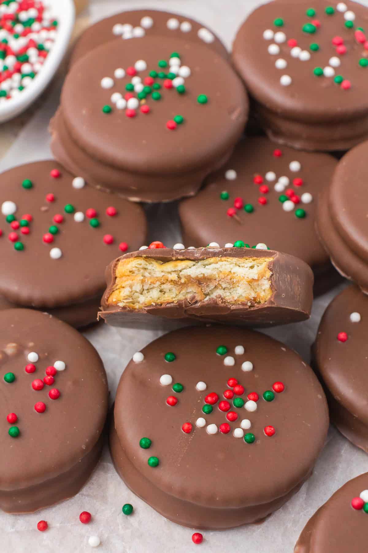 chocolate covered Ritz crackers in pile on white countertop