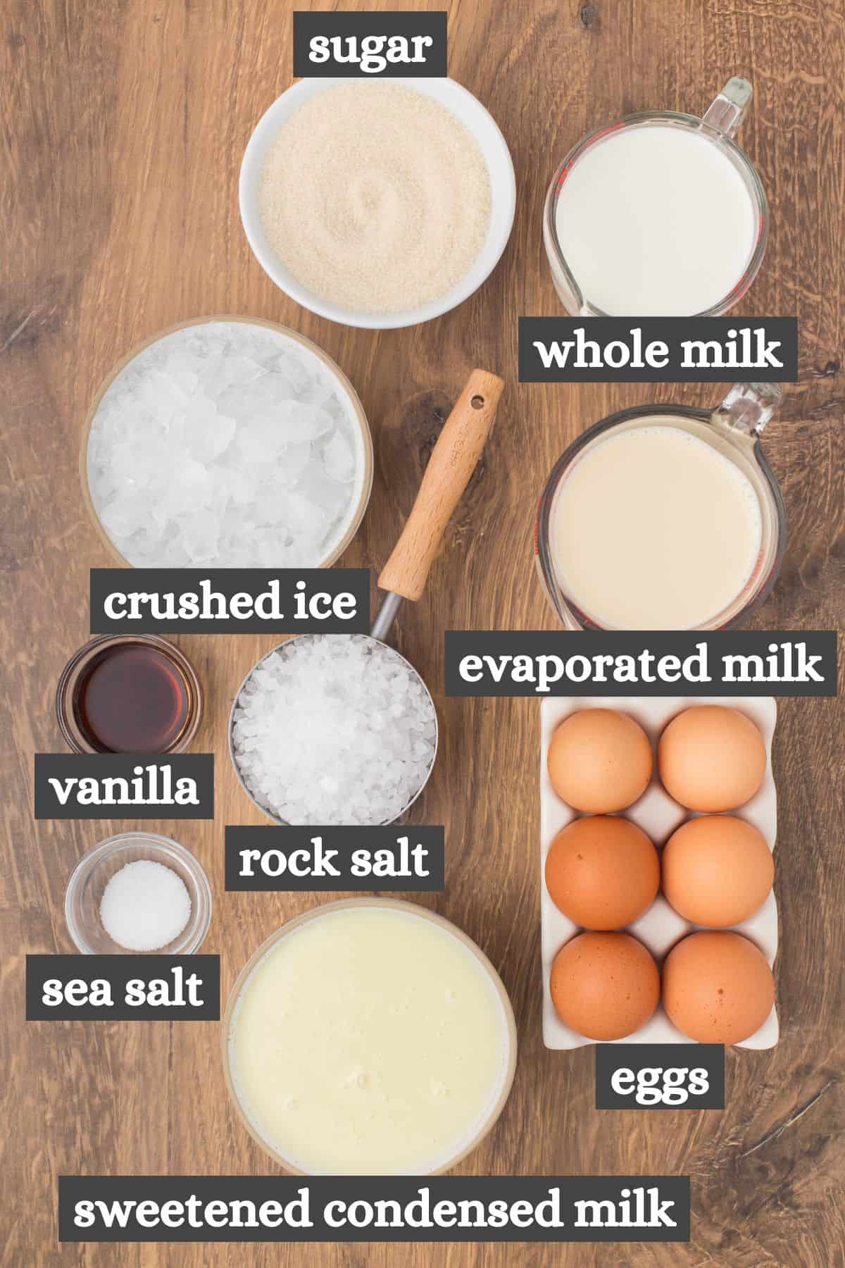 old fashioned homemade ice cream ingredients lined out on a wooden countertop