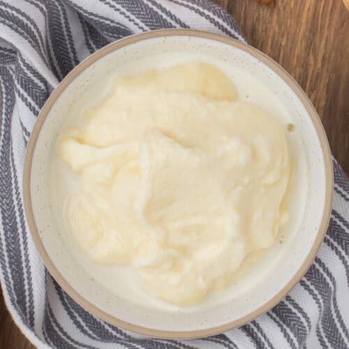 closeup shot showing a bowl full of old fashioned homemade ice cream