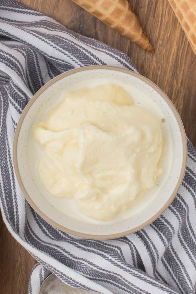 closeup shot showing a bowl full of old fashioned homemade ice cream