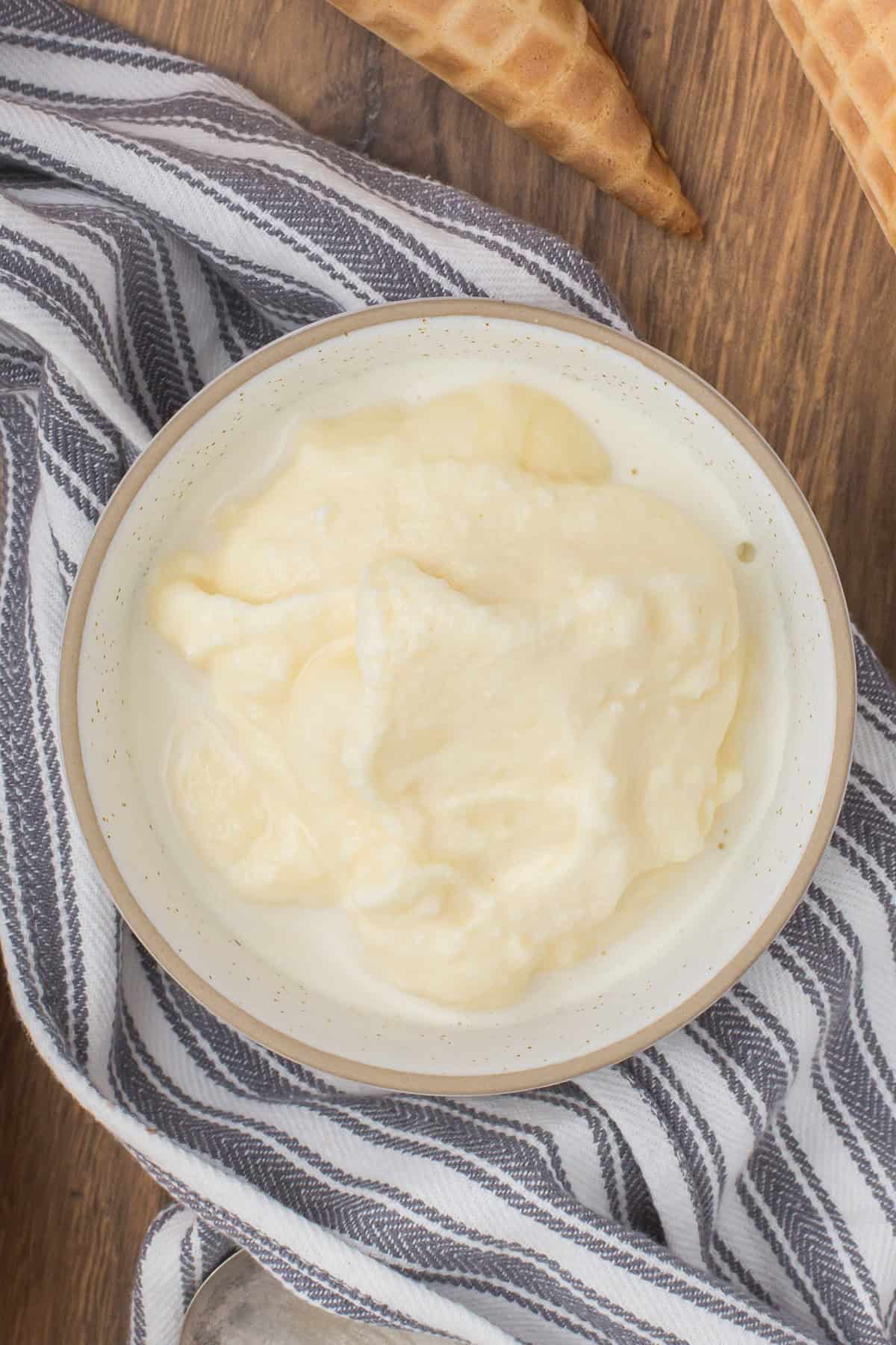 closeup shot showing a bowl full of old fashioned homemade ice cream