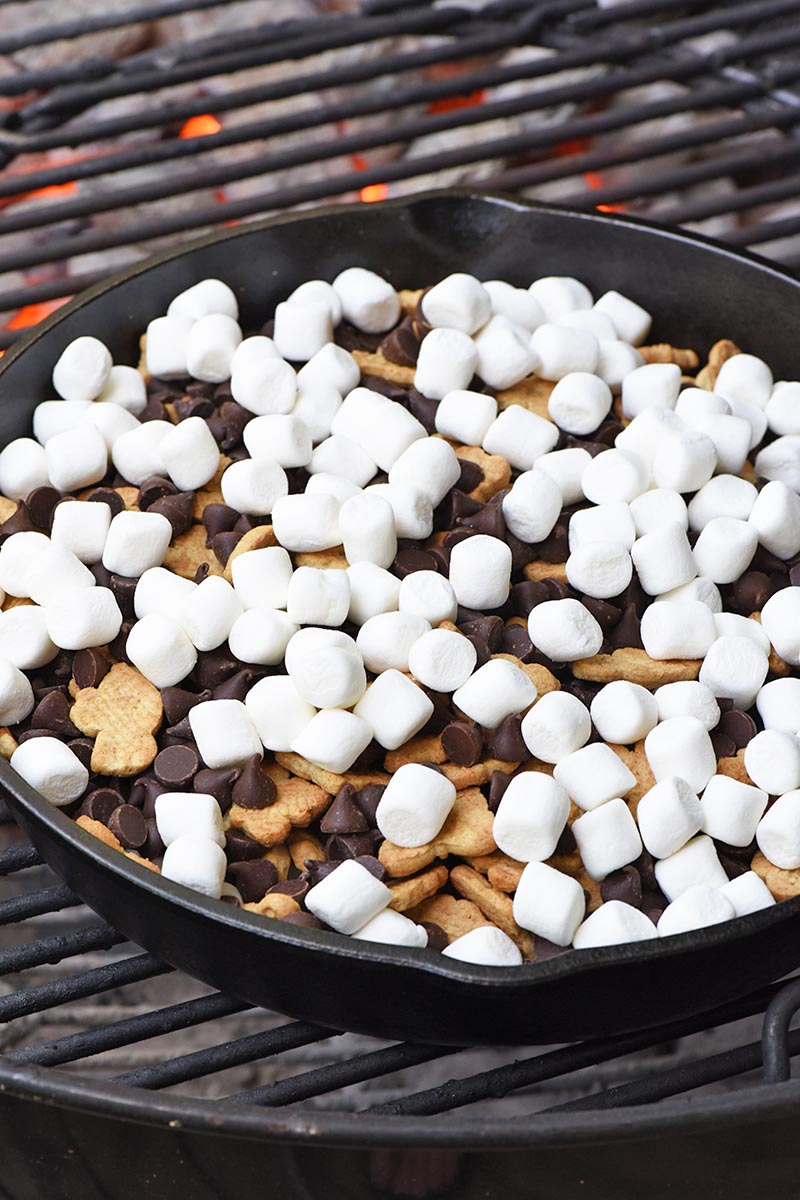 how to make s'mores without a fire, cooking s'mores dip in a cast iron skillet on a grill