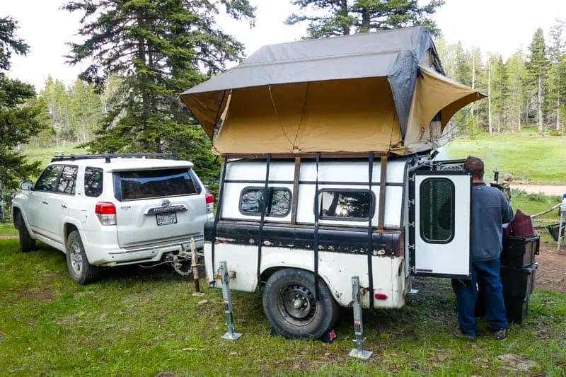wild camping with a rooftop tent and camp trailer in the Carson National Forest in New Mexico, USA